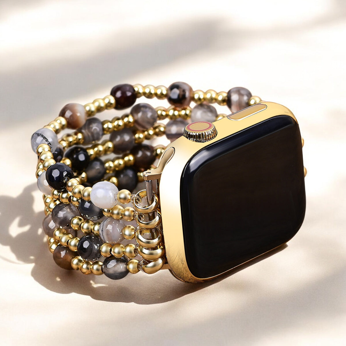Bracelet Apple Watch extensible en or et en perles