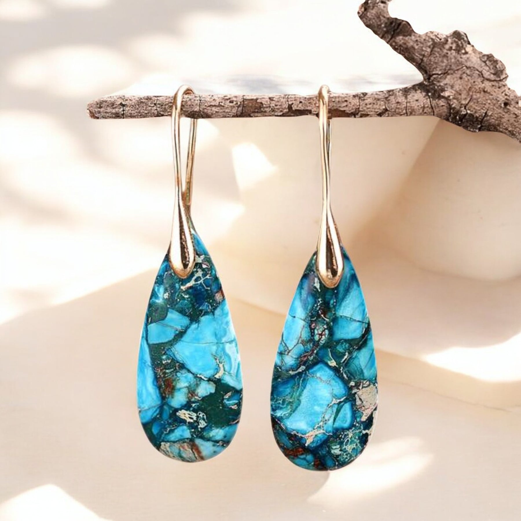 Boucles d’oreilles en forme de larme de protection de l’énergie océanique