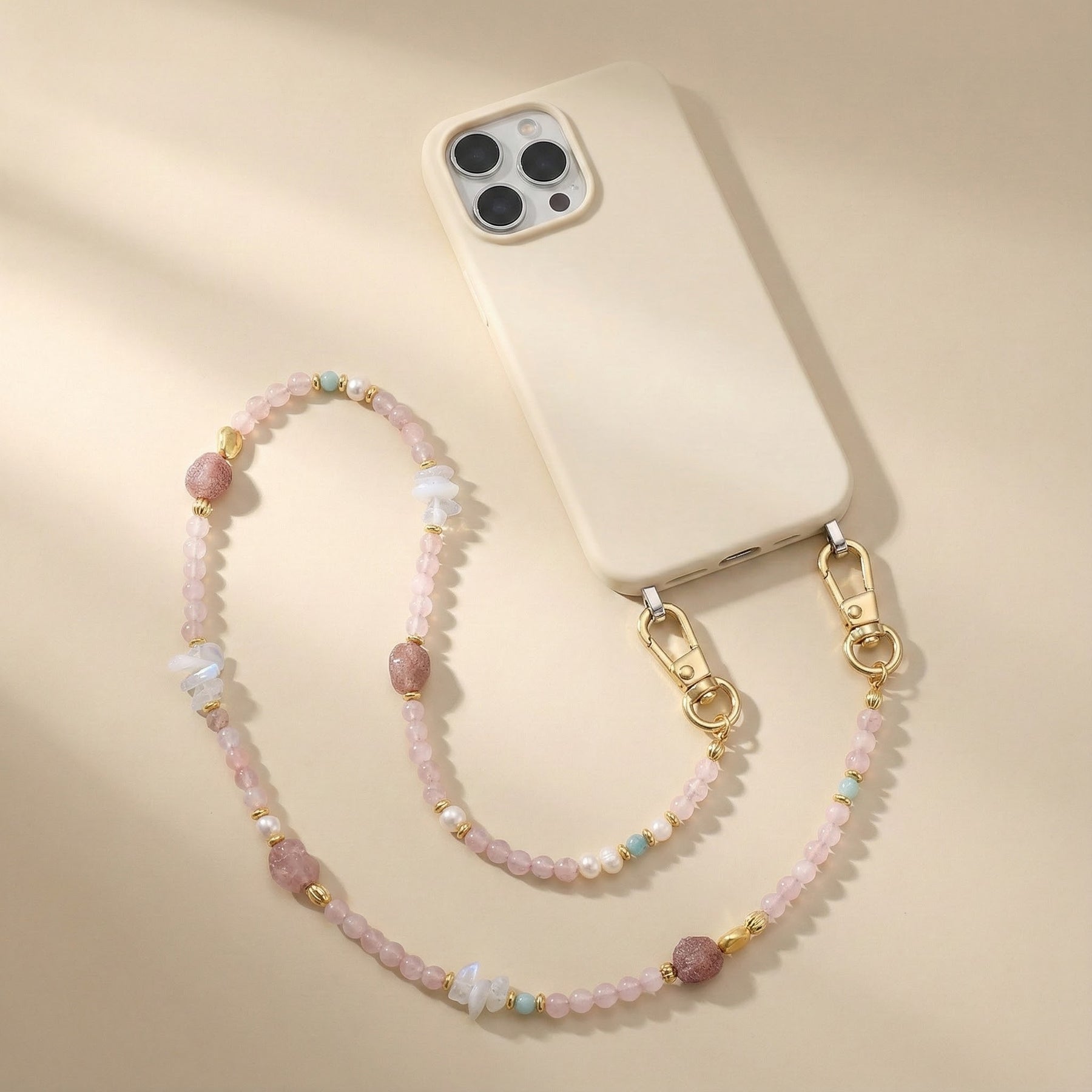 Chaîne de téléphone avec breloque en quartz rose